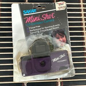 Vintage 1980s MIni Shot 110 Compact Camera Package NOS Open Package Purple